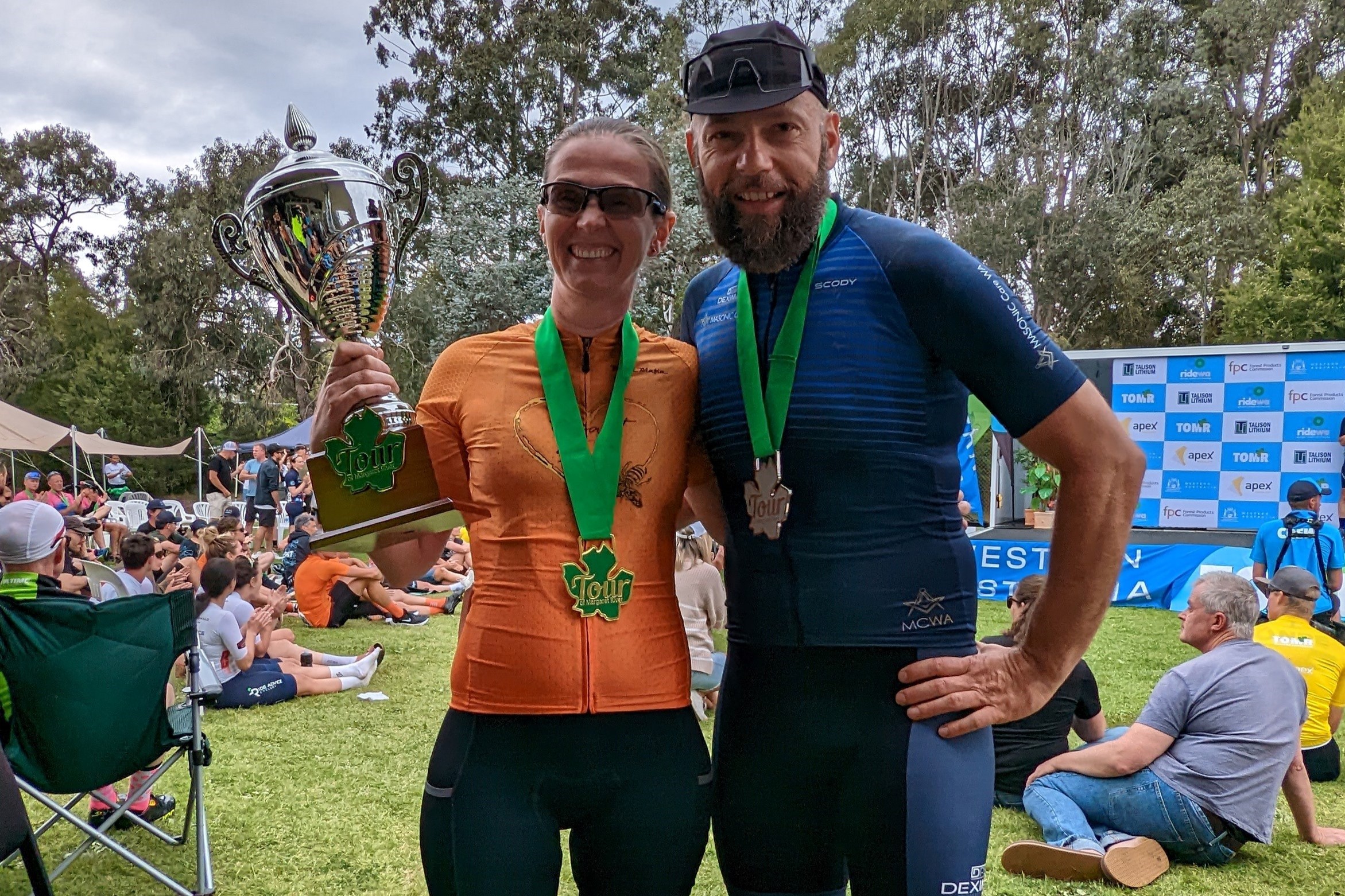 Maya and Jasmin 'JZ' Zoranjic, amateur road cyclists from Perth, pose with a trophy and medals after completing the 2024 Tour of Margaret River bicycle race